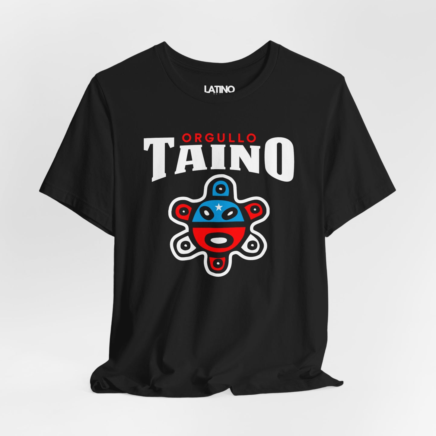 Black T-shirt with the words “Orgullo Taíno” and a colorful Taíno symbol in red, white, and blue representing Puerto Rican heritage.