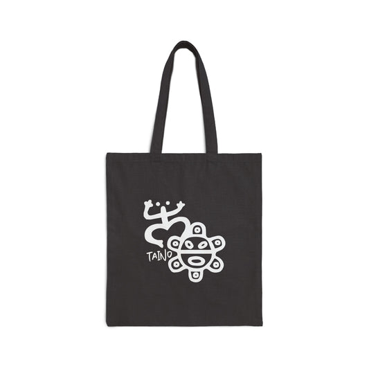 Black canvas tote bag with a white graphic of Taino symbols and the word 'TAINO' in the center.
