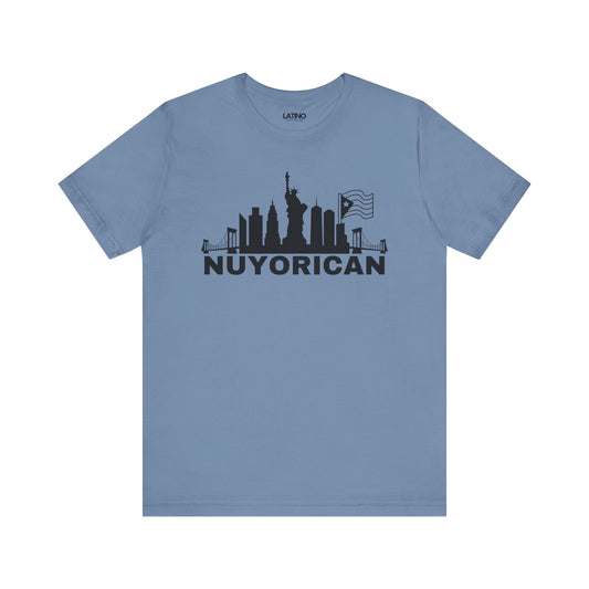 A blue t-shirt with a graphic print that includes the New York City skyline, the Statue of Liberty, and the Puerto Rican flag, along with the text 'NUYORICAN'.