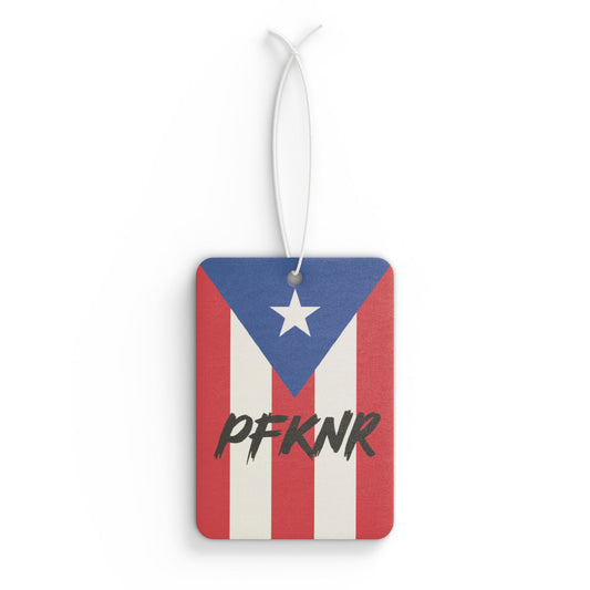 A rectangular car air freshener with a printed Puerto Rican flag design and the text 'PFKNR' on it, hanging by a string.