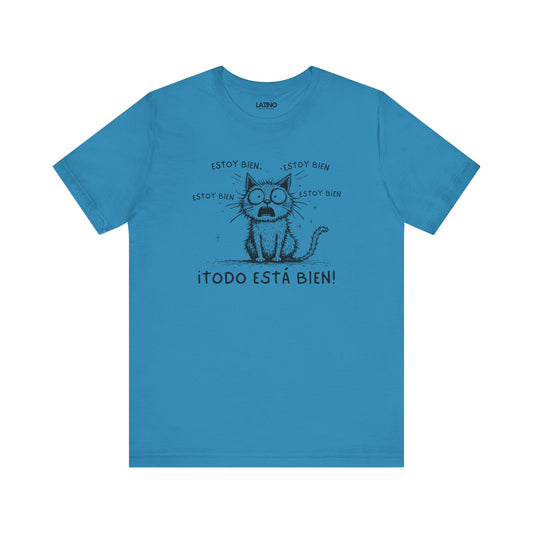 Blue t-shirt with a graphic of a surprised-looking cat and the text 'Todo Está Bien!' in bold black letters.