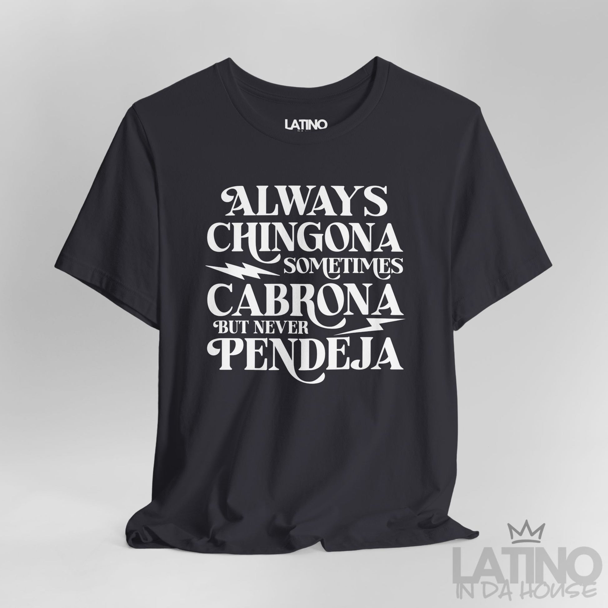 Close-up of dark grey T-shirt with bold white “Always Chingona Sometimes Cabrona But Never Pendeja” design. Latino In Da House