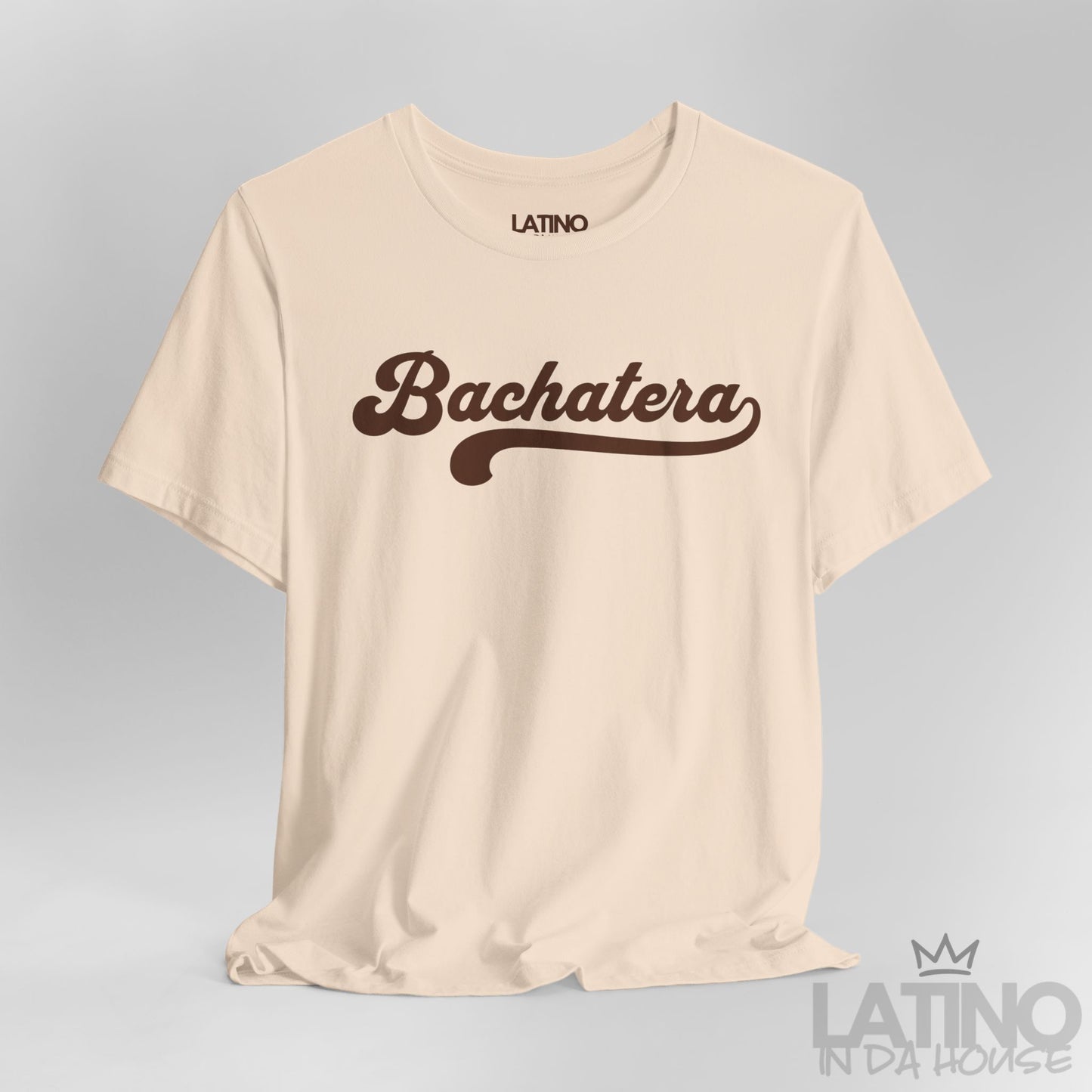 Close Up Soft Cream Bachatera T-Shirt with bold brown script text inspired by bachata and Latin pride. Latino In Da House