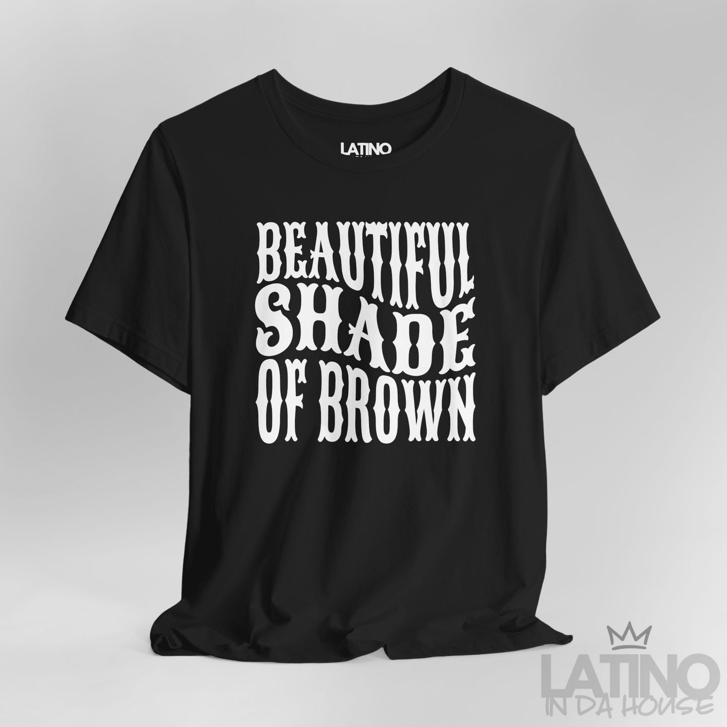 Close-up of black T-shirt design with bold white “Beautiful Shade of Brown” text. Latino In Da House