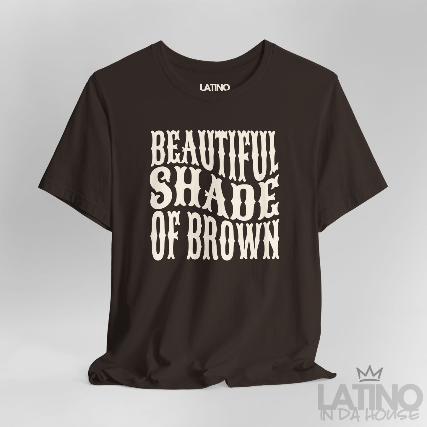 Close-up of brown T-shirt design with cream “Beautiful Shade of Brown” text. Latino In Da House