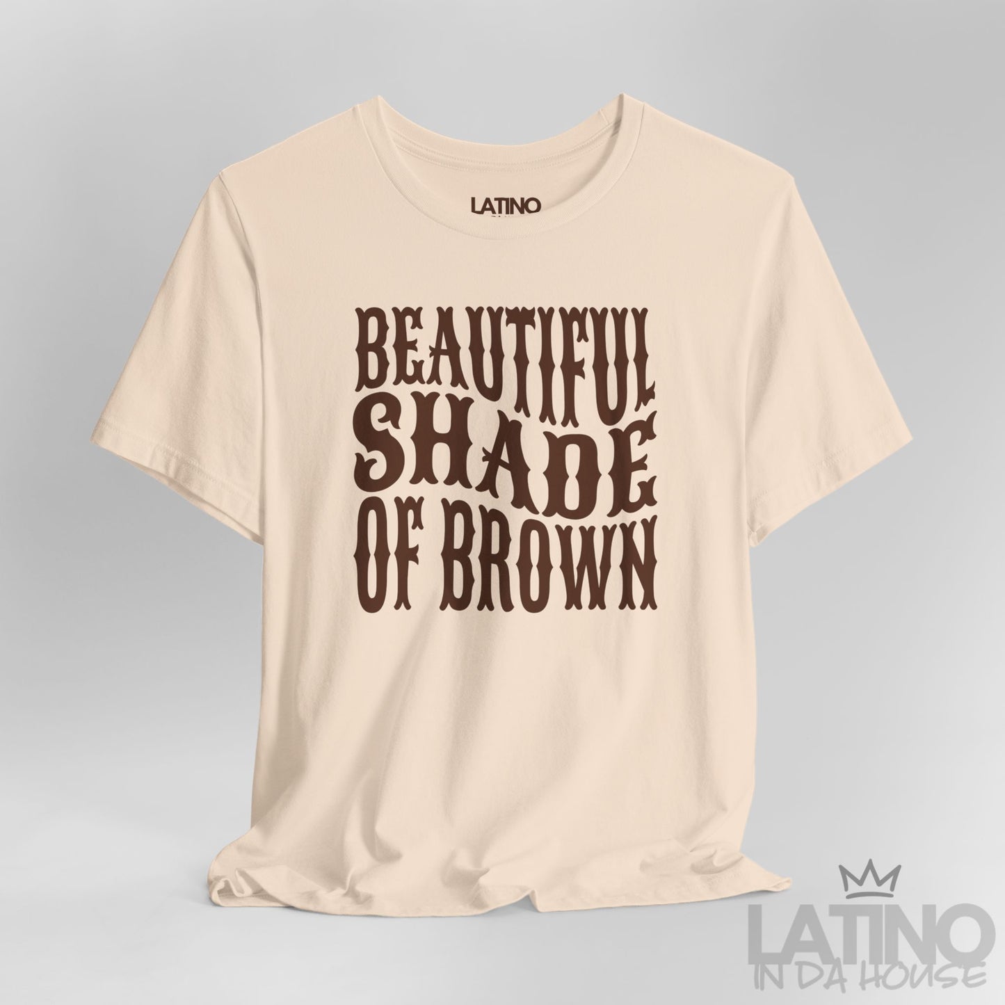 Close-up of soft cream T-shirt design with brown “Beautiful Shade of Brown” text. Latino In Da House