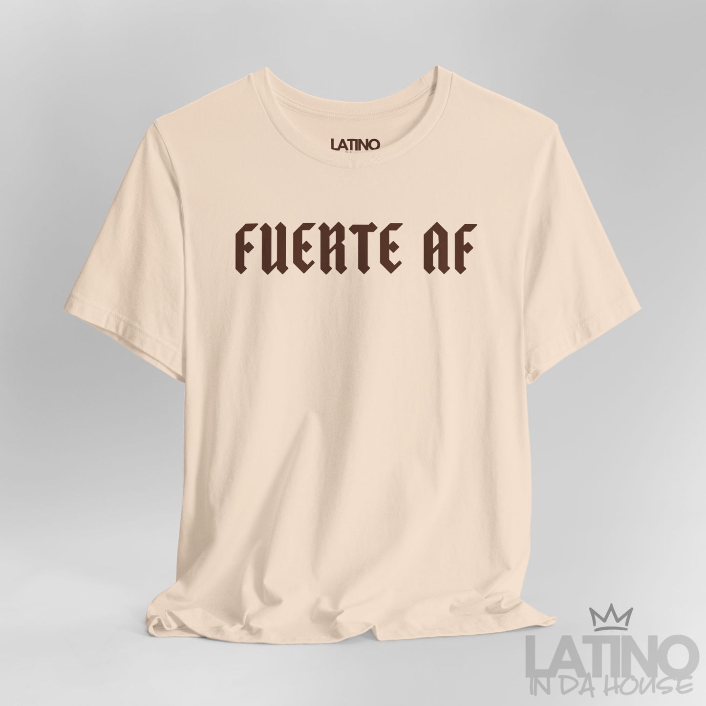 Close-up view of Fuerte AF T-Shirt in soft cream with bold brown gothic lettering. Latino In Da House