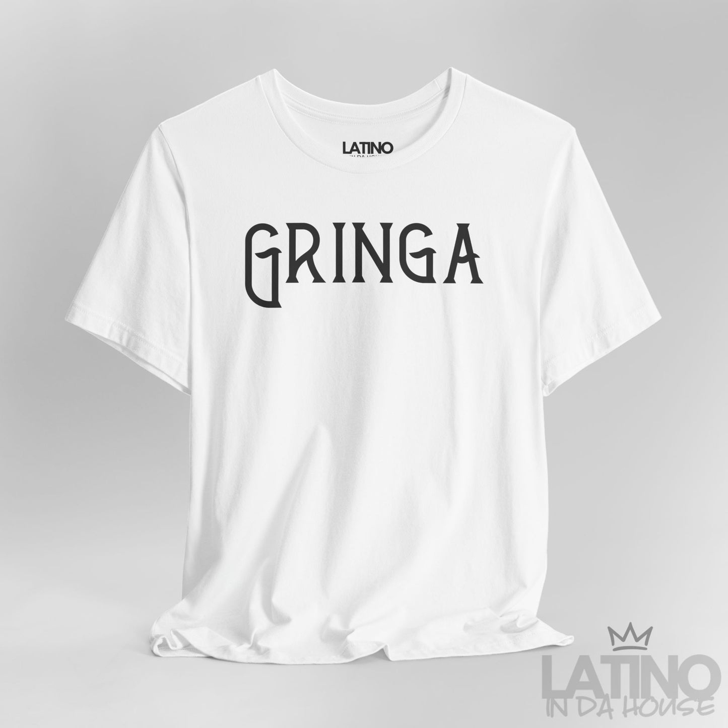 Close-up of white Gringa T-Shirt design with bold gothic text. Latino In Da House