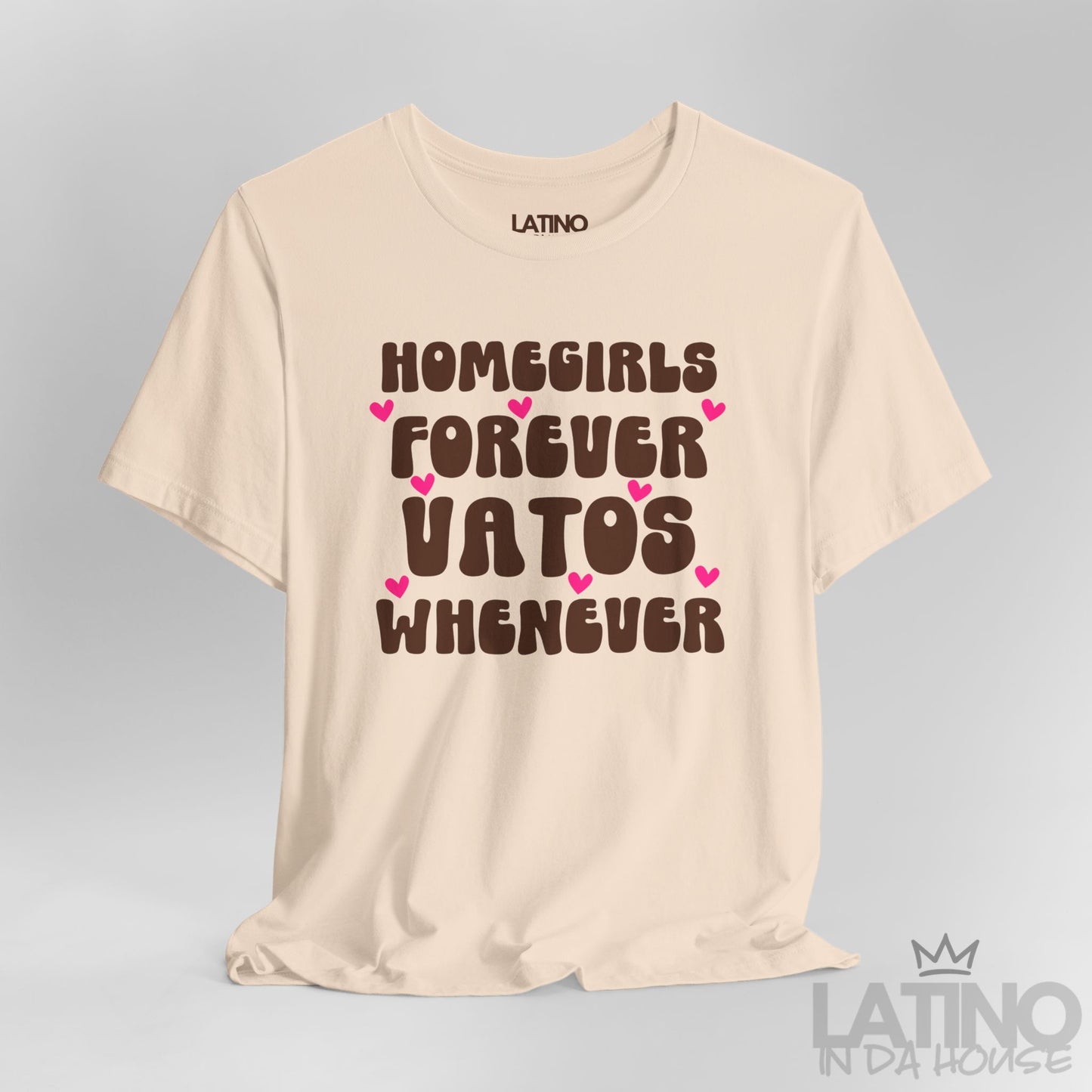 Closeup of design on soft cream “Homegirls Forever Vatos Whenever” shirt. Latino In Da House