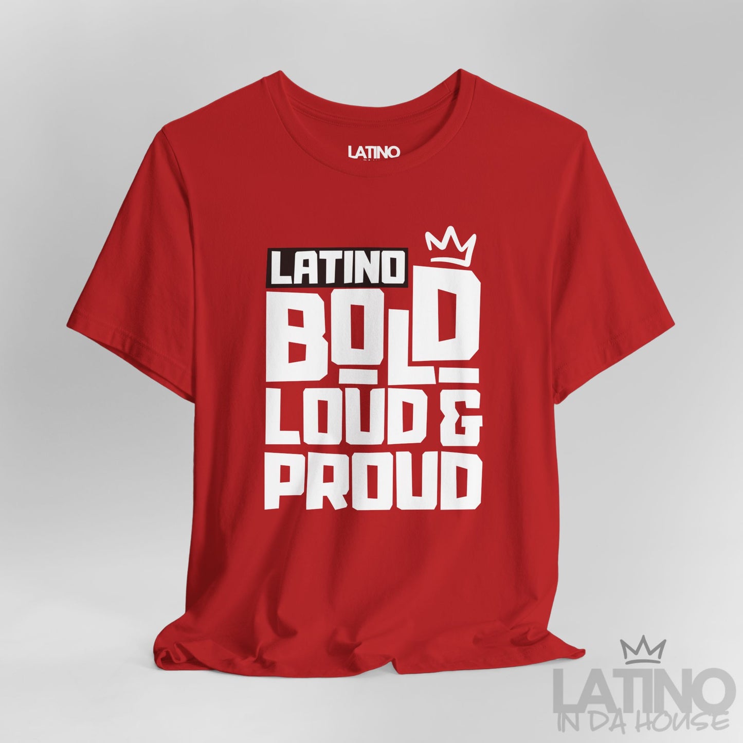 Close-up view of Latino Bold Loud & Proud T-Shirt in red with bold white design and crown logo. Latino In Da House