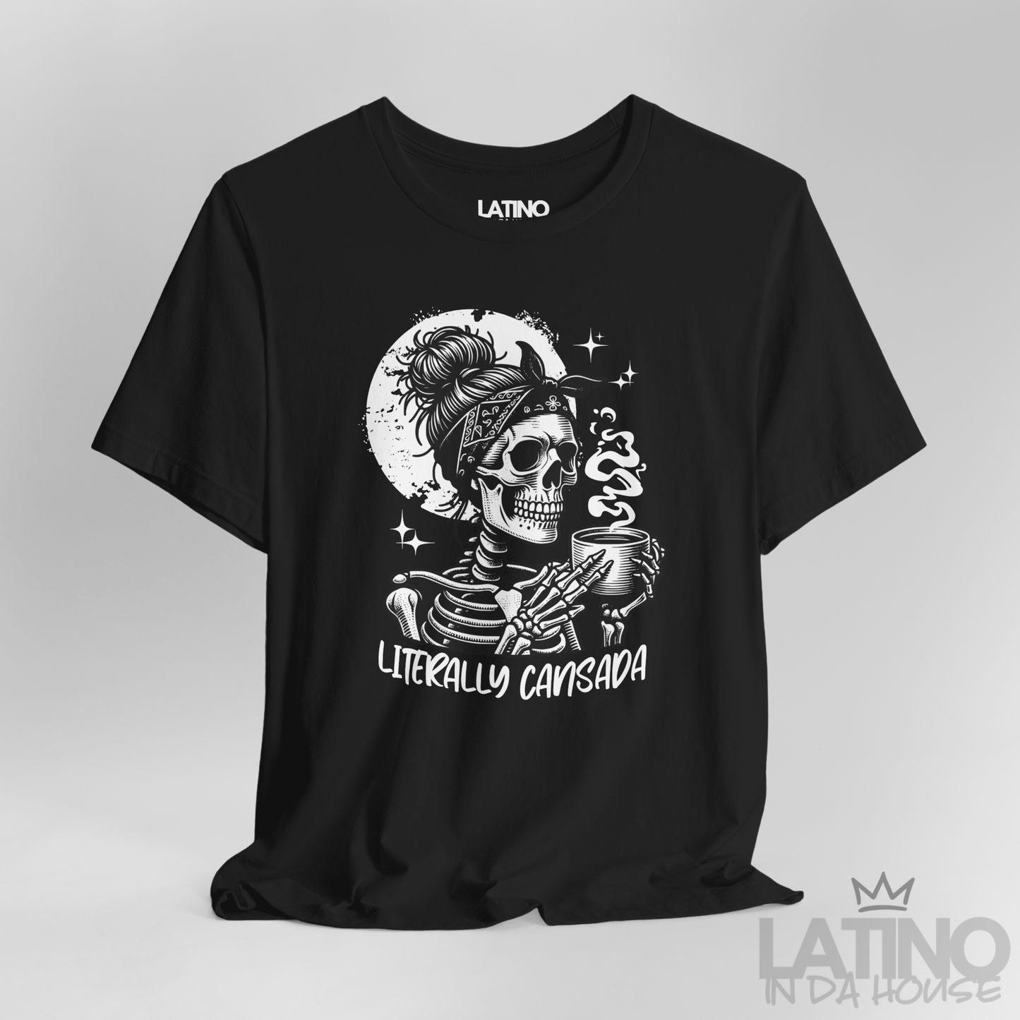 Close-up of black T-shirt design featuring skeleton with coffee and text “Literally Cansada. Latino In Da House