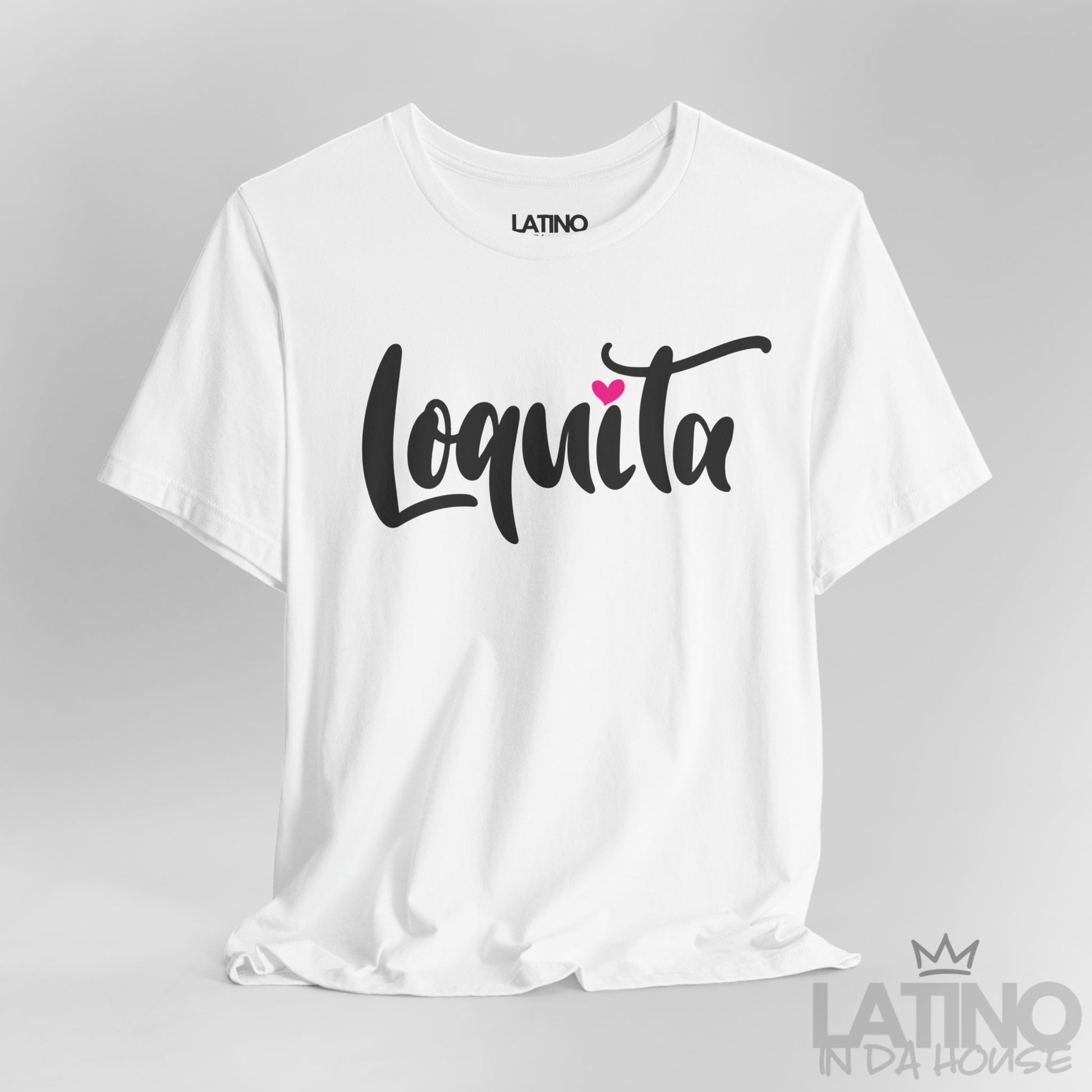 Closeup of Loquita T-shirt in white with pink heart detail on lettering – Latino In Da House