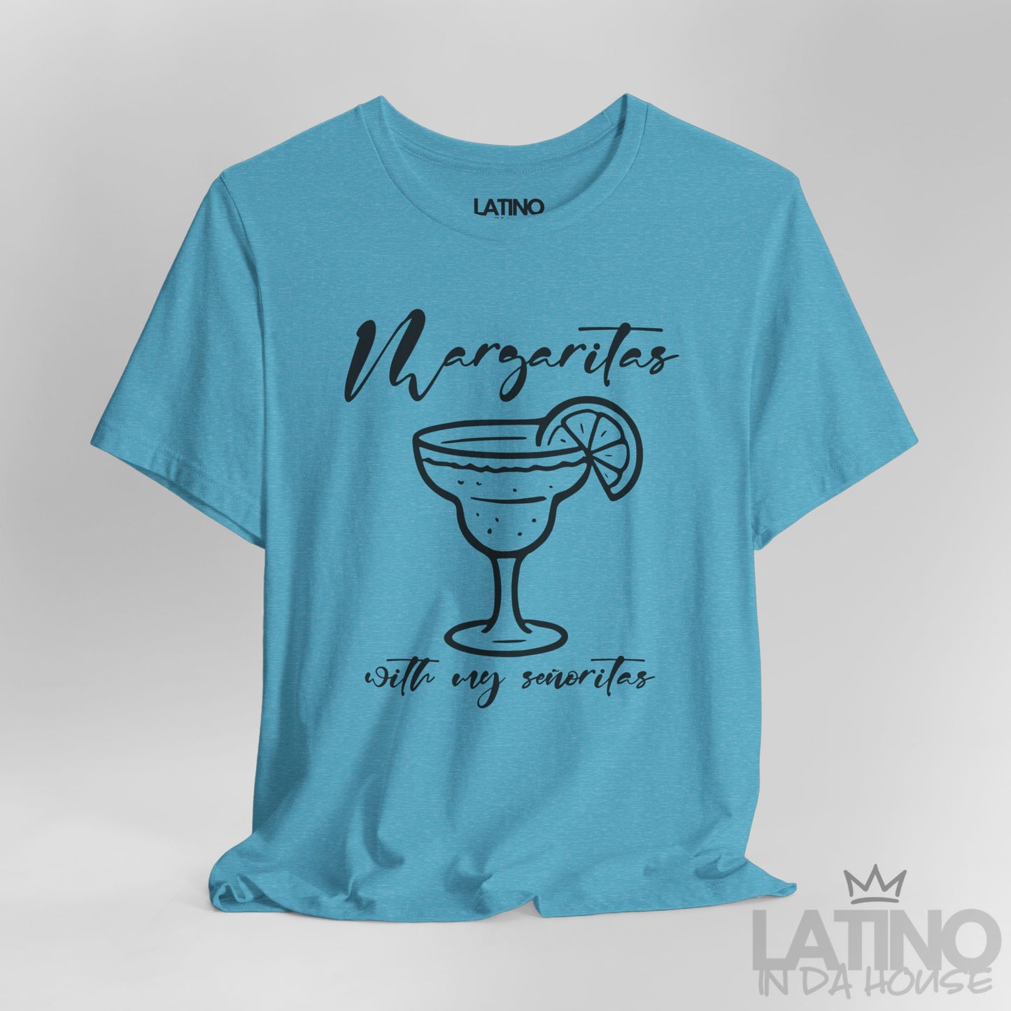 Close-up of heather aqua T-shirt design with margarita glass and text. Latino In Da House