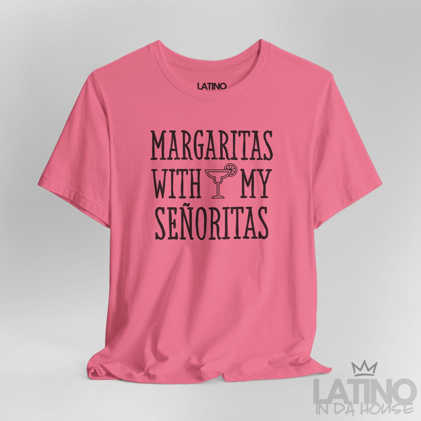 Close-up of pink T-shirt design with margarita glass and text. Latino In Da House