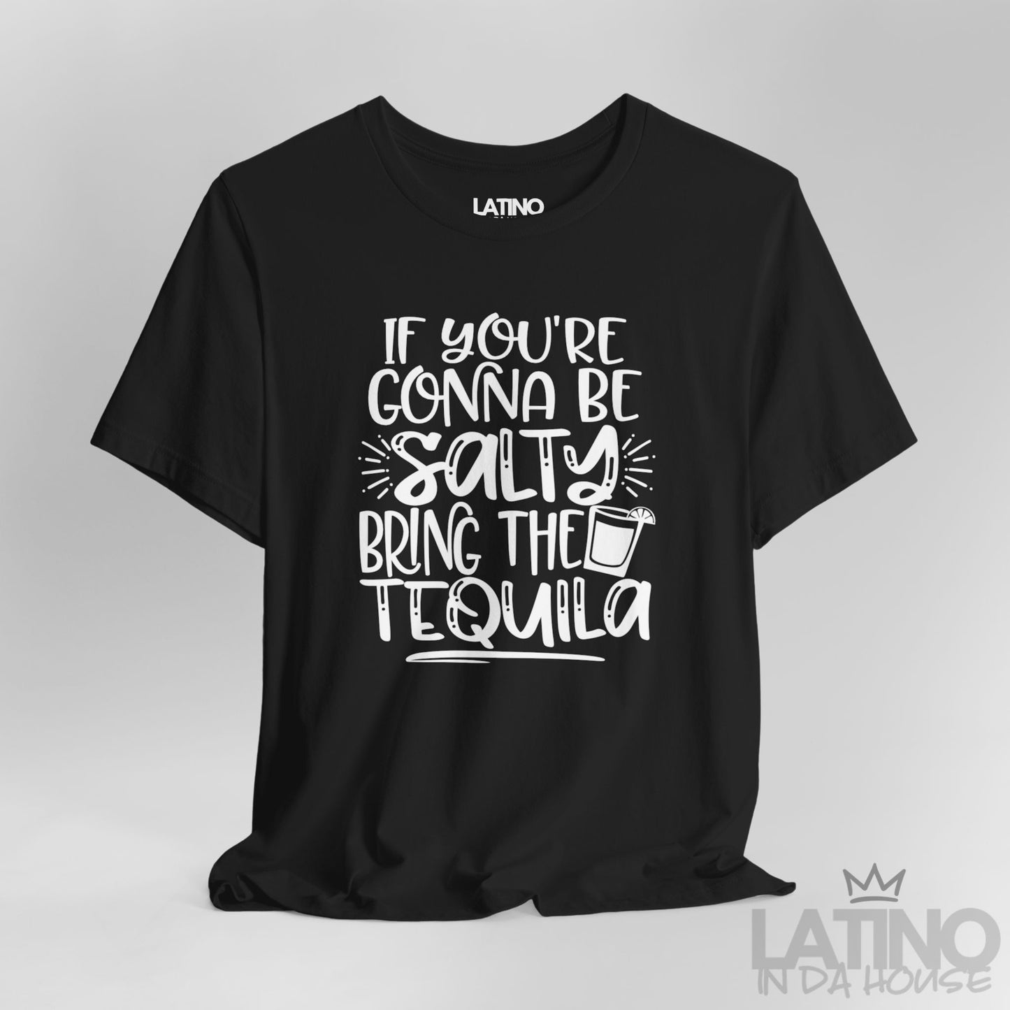 Close-up of black T-shirt design with salty tequila phrase and cocktail glass. Latino In Da House