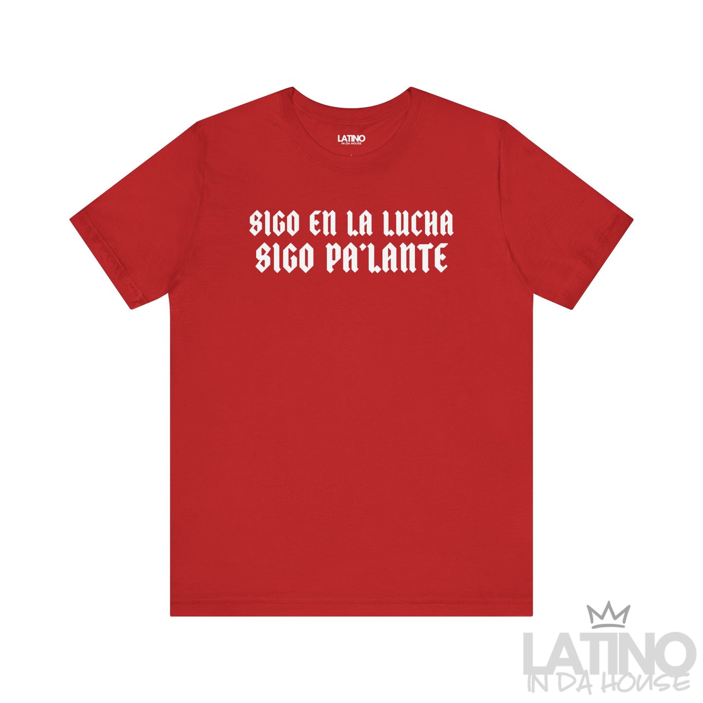 Red T-shirt with bold gothic white text reading “Sigo en la lucha, sigo pa’lante.” Latino In Da House