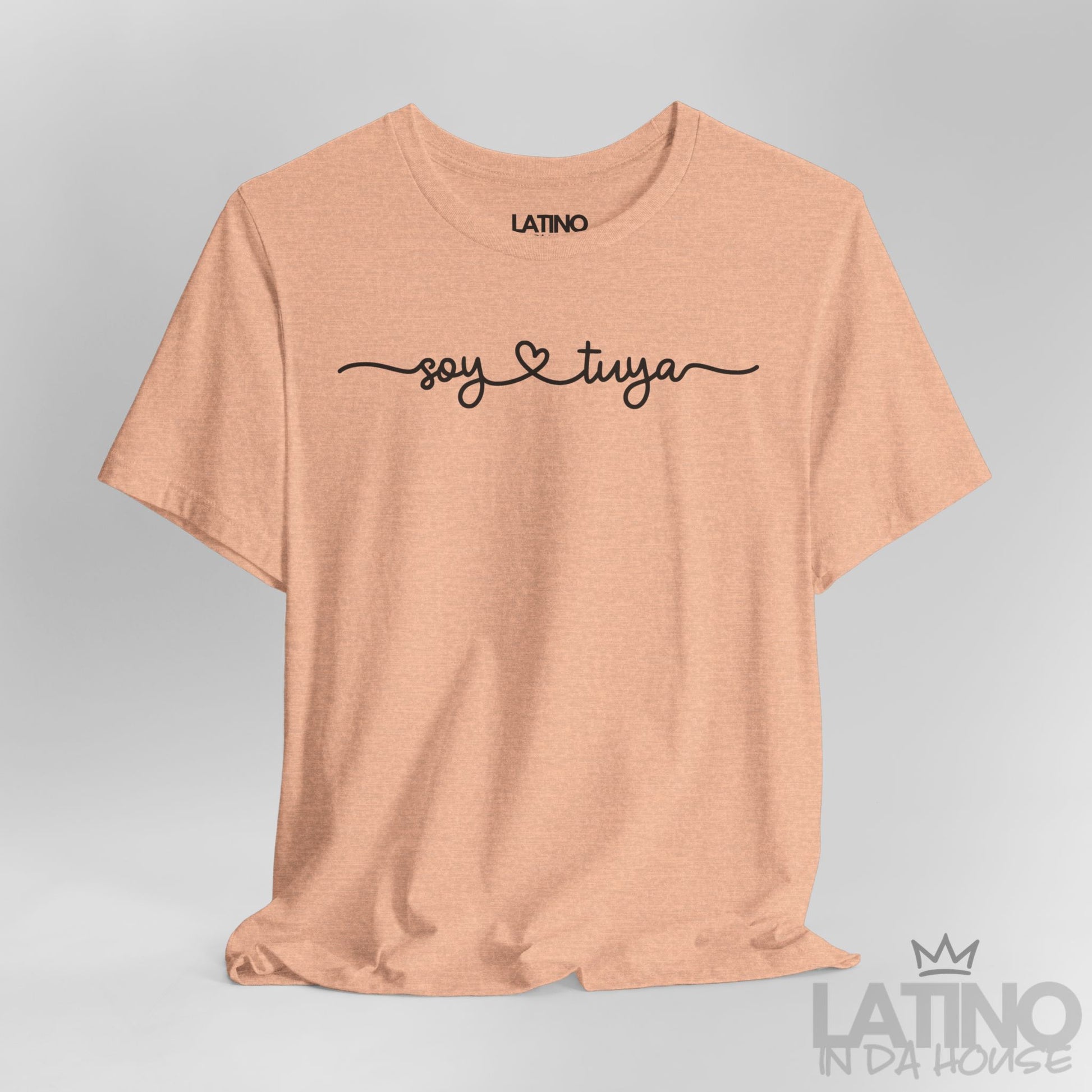 Close-up of Soy Tuya T-Shirt in Heather Peach – romantic Spanish graphic. Latino In Da House