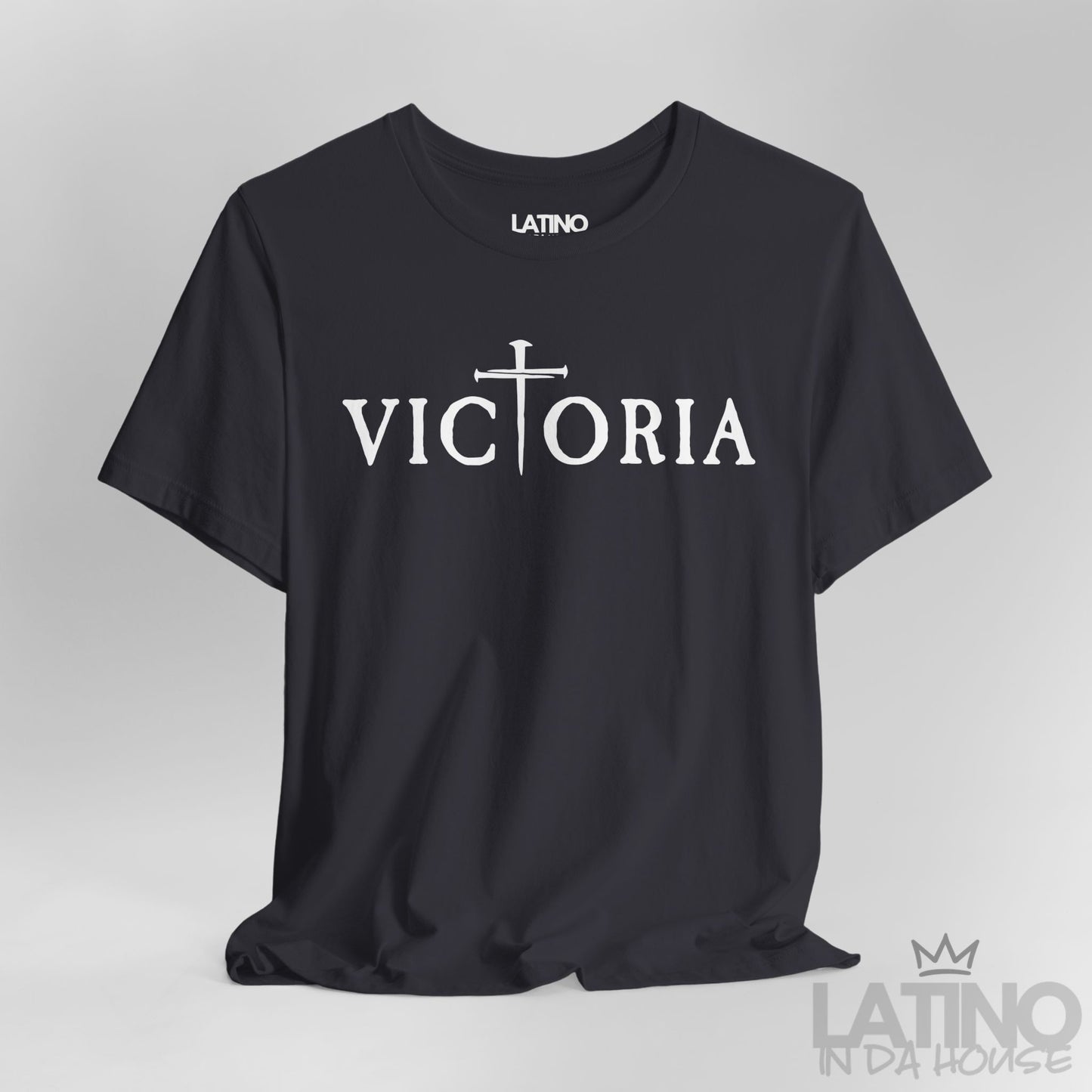Close-up of Victoria Dark Grey T-Shirt showing gothic lettering and cross forming the T. Latino In Da House