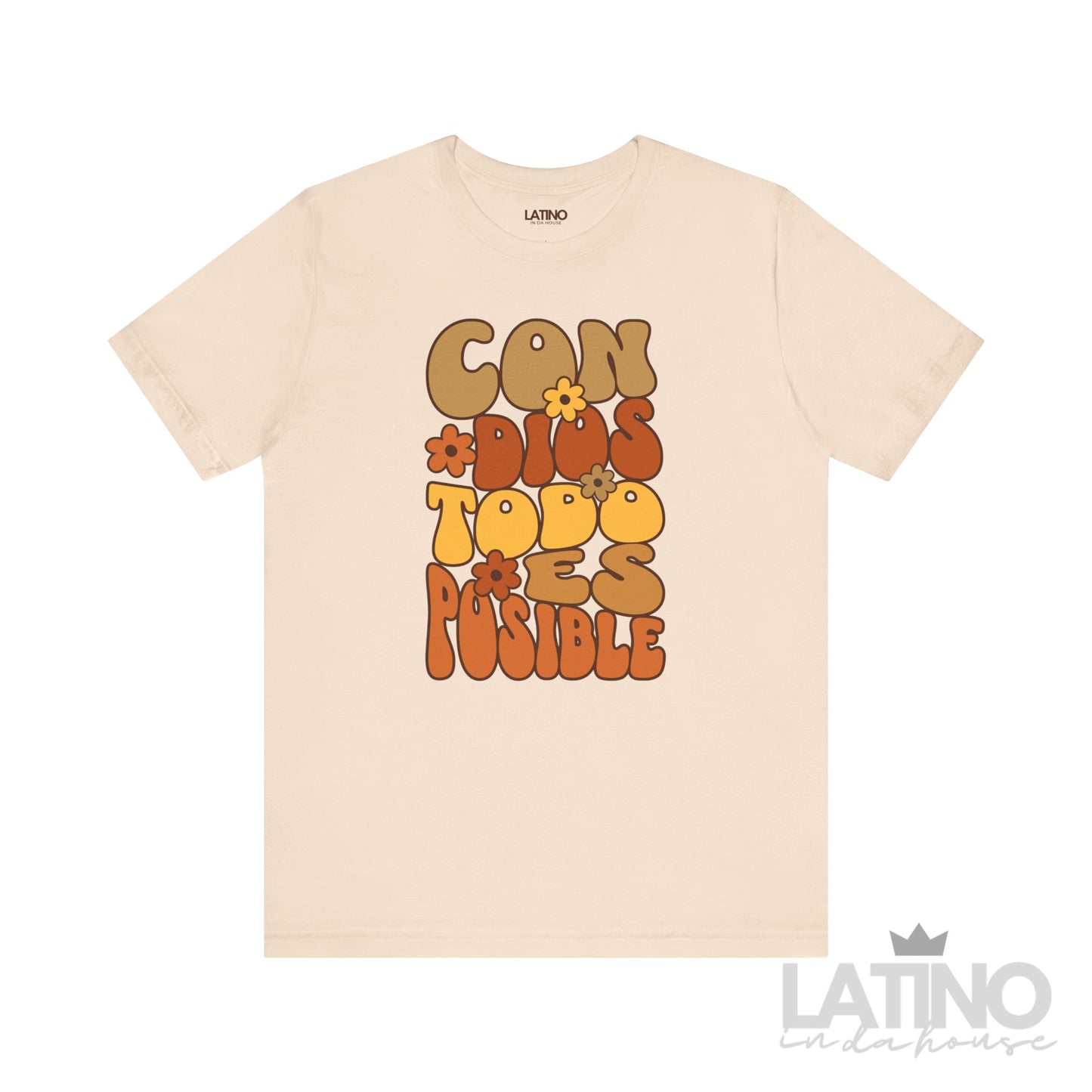 Soft cream T-shirt with retro floral typography reading “Con Dios Todo Es Posible” in brown, orange, and yellow, faith-based Christian design by Latino In Da House.
