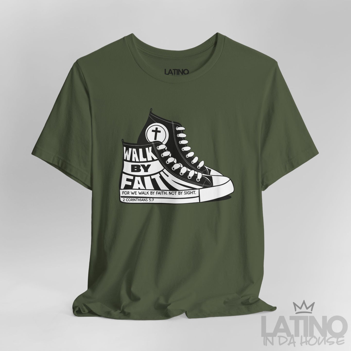 Close-up of Walk By Faith Military Green T-shirt showing sneaker details and 2 Corinthians 5:7 text on sole. Latino In Da House