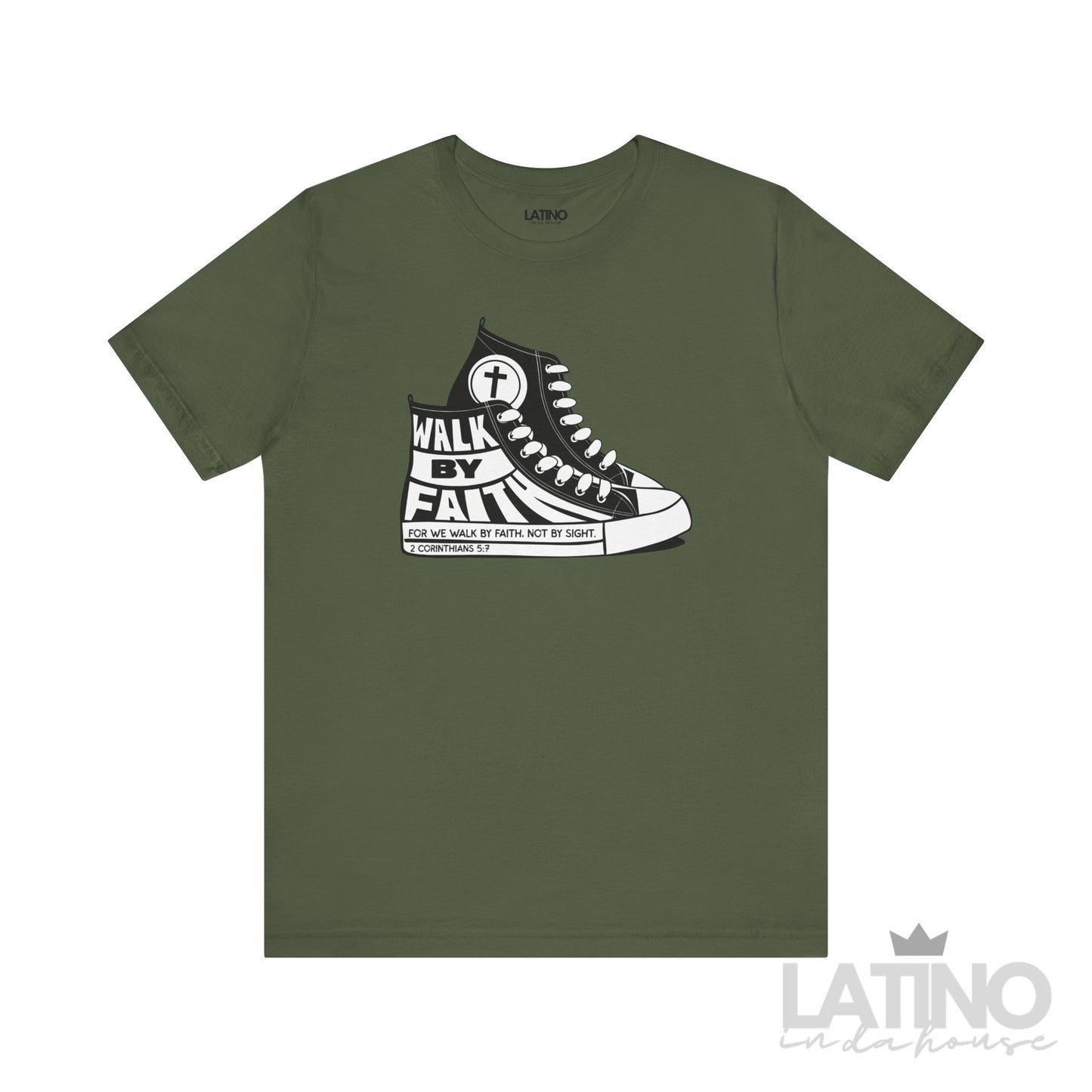 Military green T-shirt featuring a black and white Converse-style sneaker graphic with the phrase “Walk By Faith” and Bible verse 2 Corinthians 5:7.