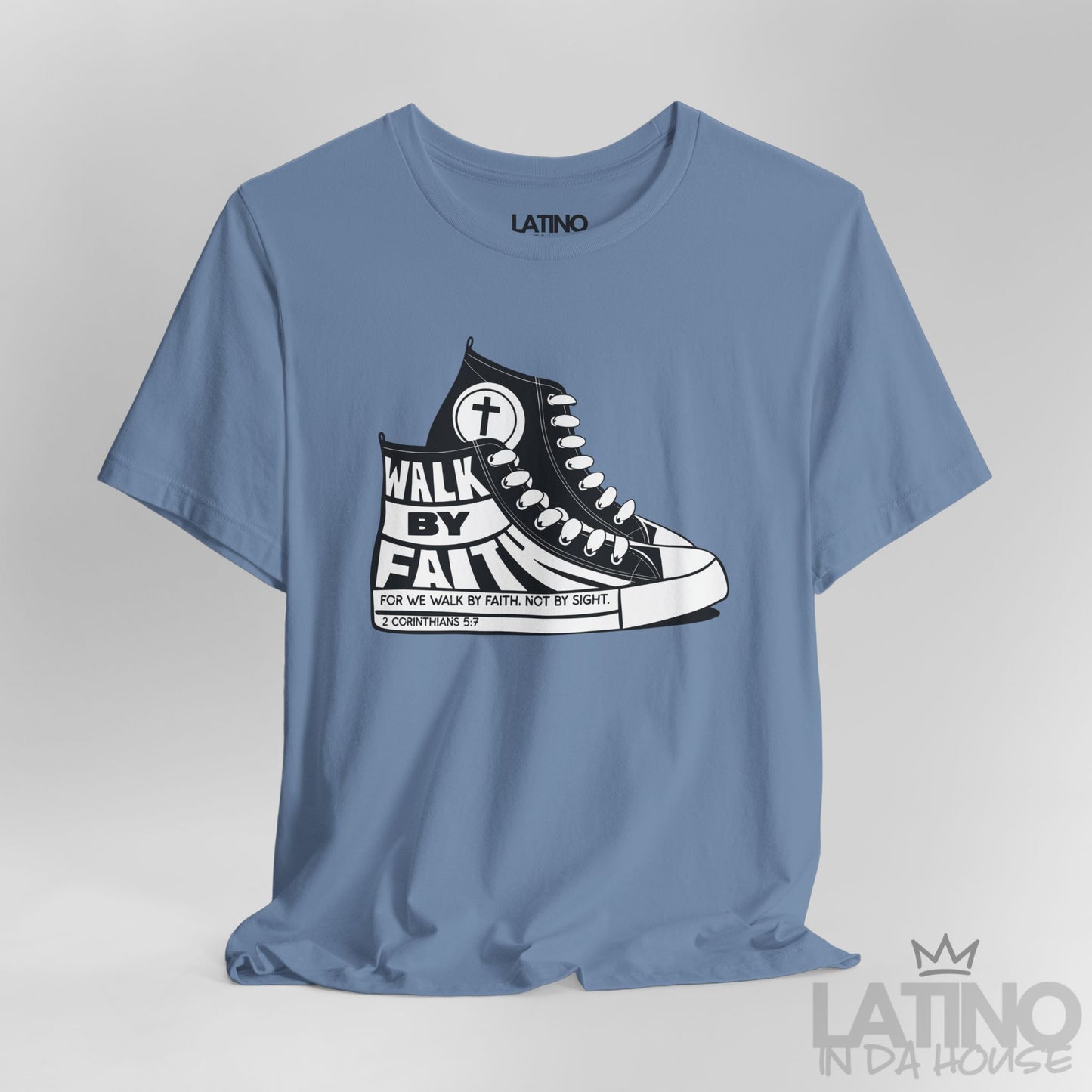Close-up of Walk By Faith Steel Blue T-shirt showing sneaker details and 2 Corinthians 5:7 text on sole. Latino In Da House