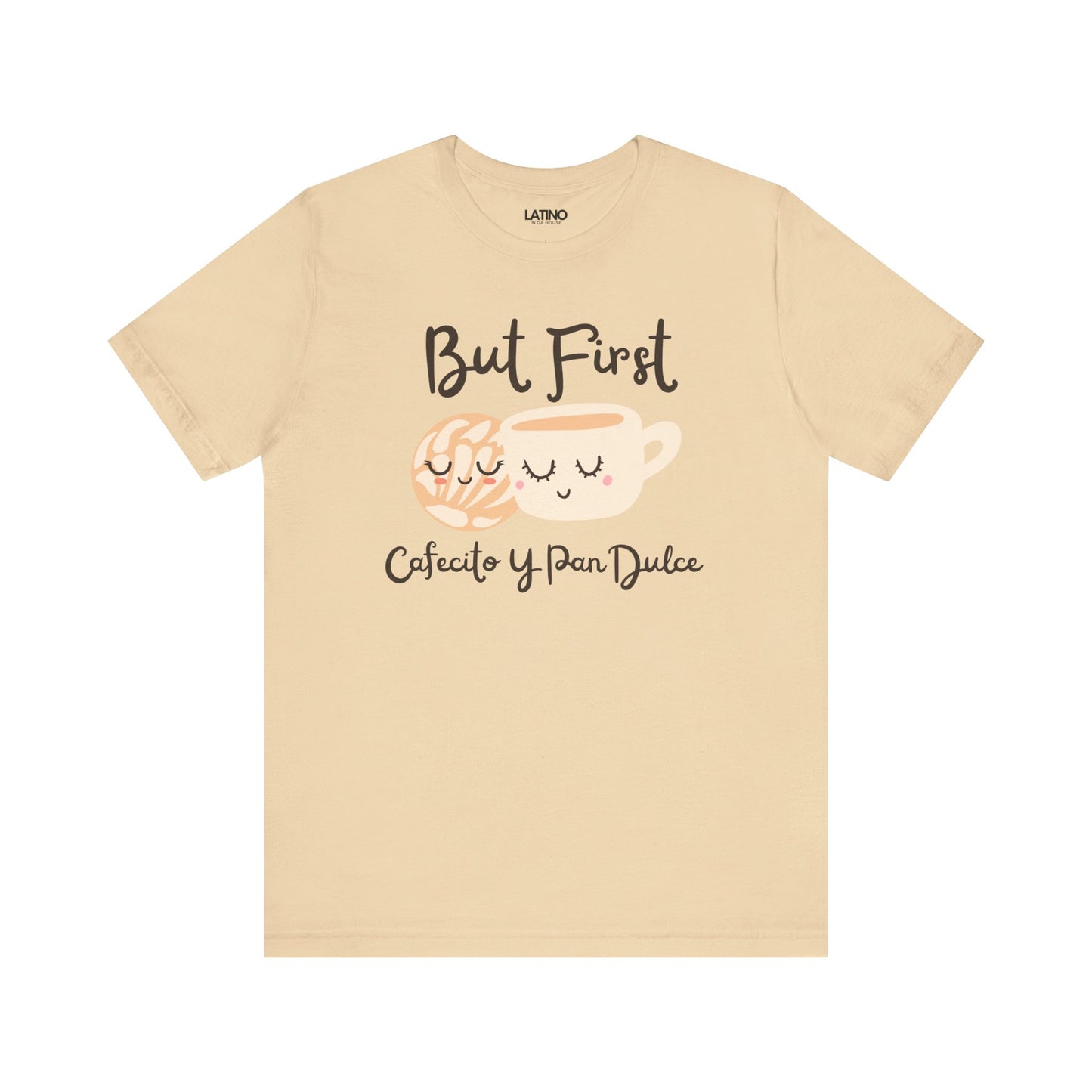 Beige t-shirt with coffee cup and text design on a white background but first cafecito y pan Dulce