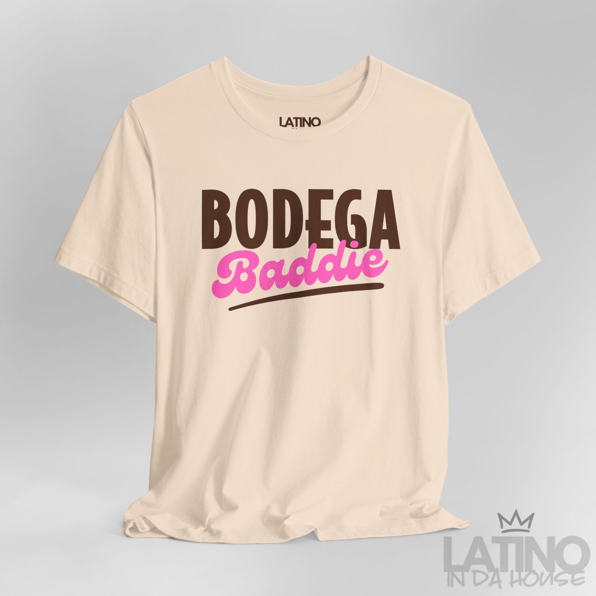 Close Up Bodega Baddie T-Shirt in soft cream with bold brown and pink text design – Latino In Da House