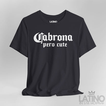 Close-up of dark grey “Cabrona Pero Cute” T-Shirt white gothic text. Latino In Da House