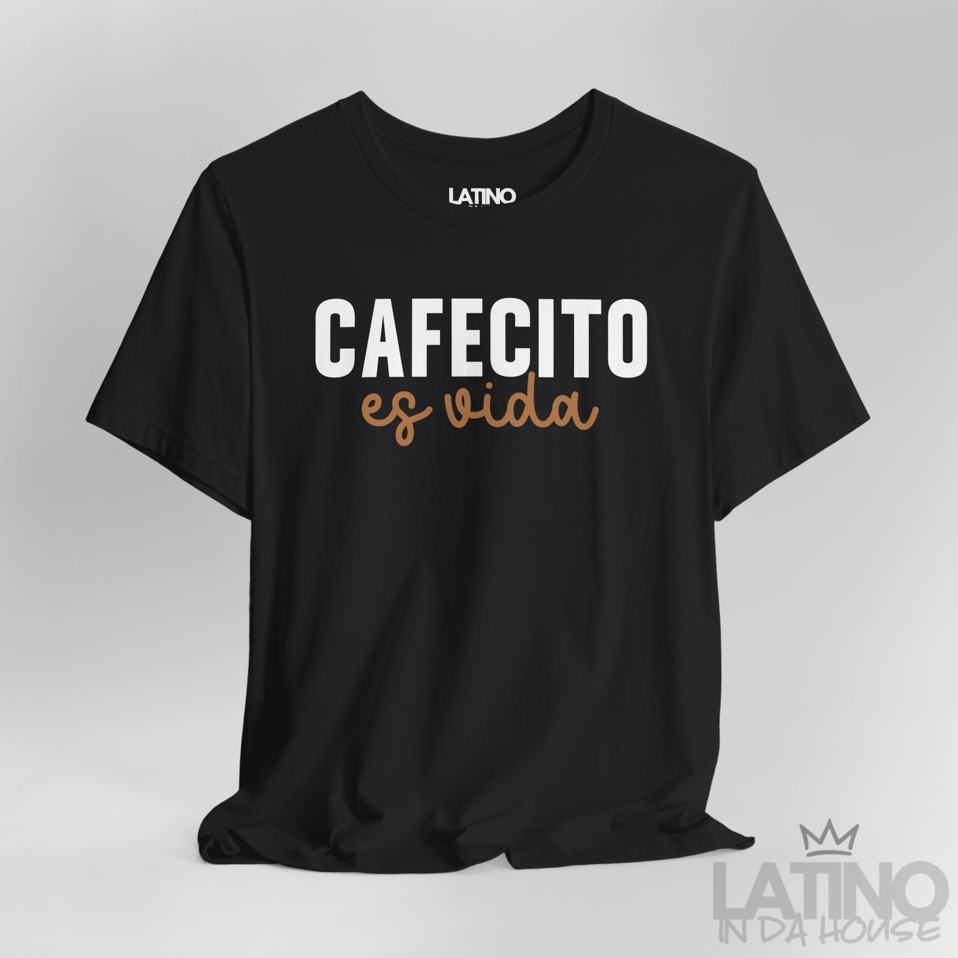 Close up view of Cafecito Es Vida design on black shirt. Latino In Da House 