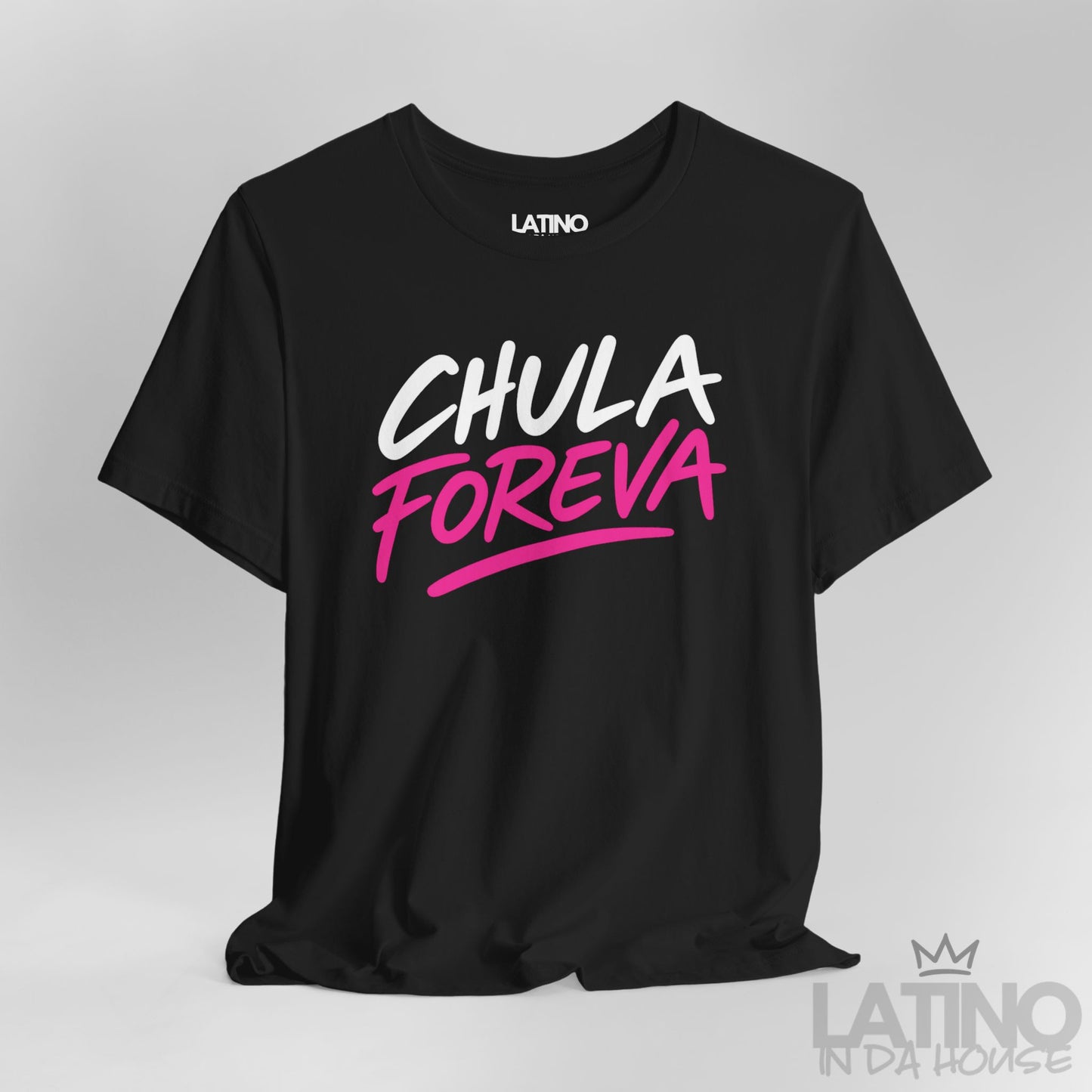 Close-up of black t-shirt with the phrase "Chula Foreva" in bold white and hot pink lettering, Latino In Da House.