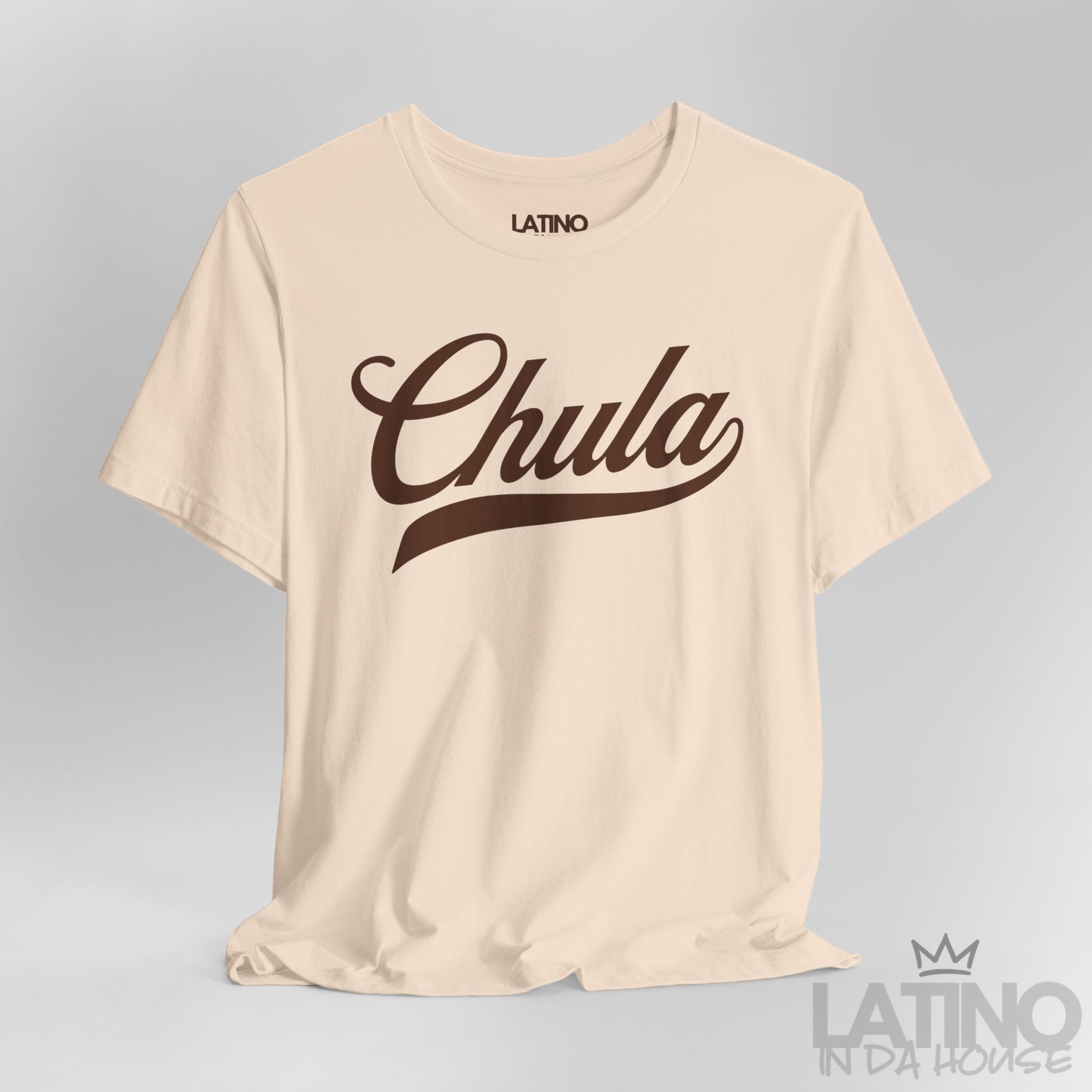 Close-up of Chula script design on soft cream T-shirt. Latino In Da House 