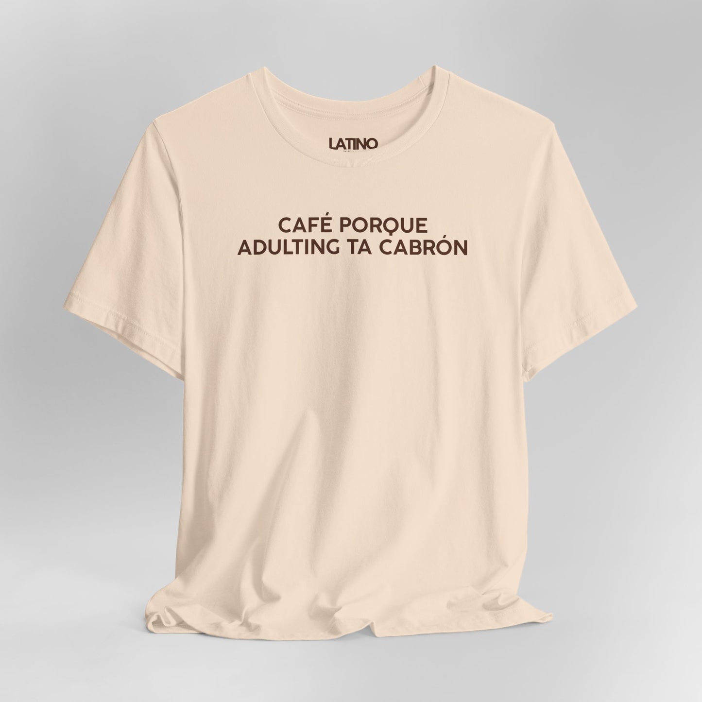 Close Up Café Porque Adulting Ta Cabrón
T-Shirt in soft cream with brown bold text
- Latino In Da House