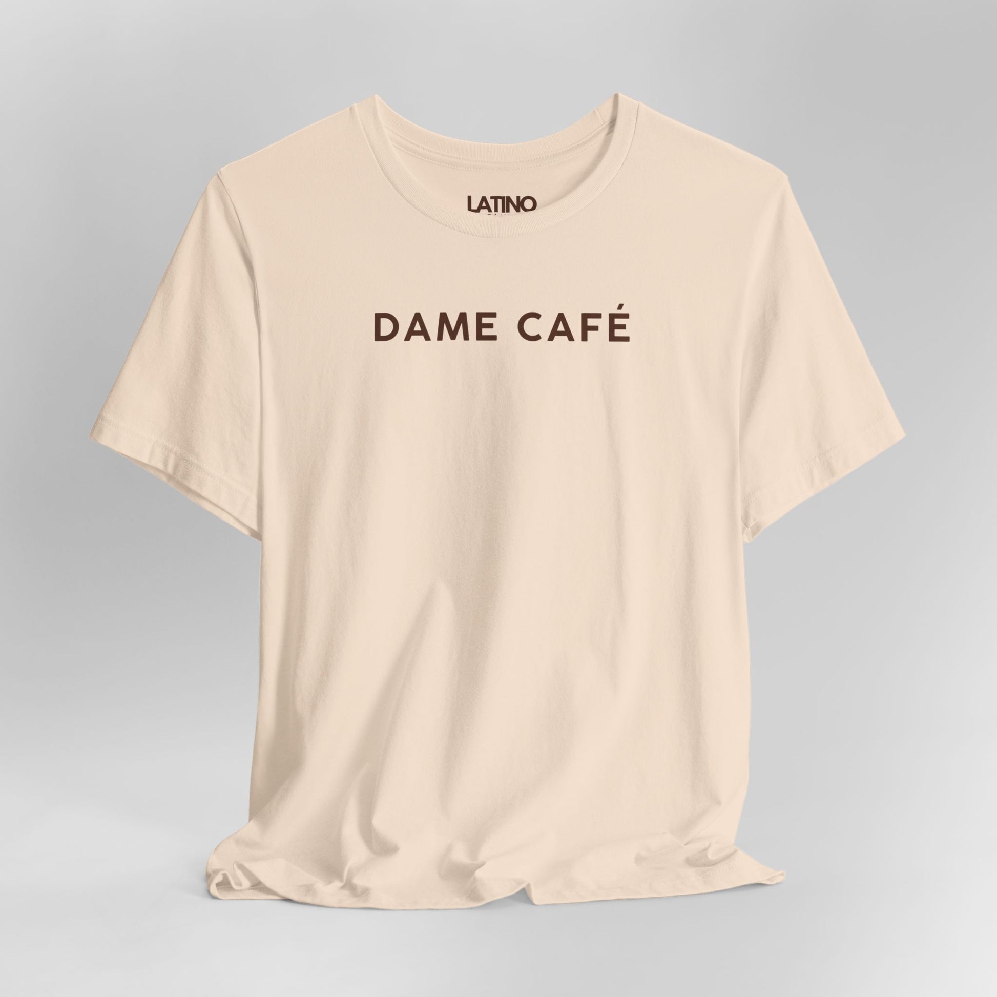 Close Up Dame Cafe T-Shirt in soft cream
with white simple text print - Latino In Da
House
