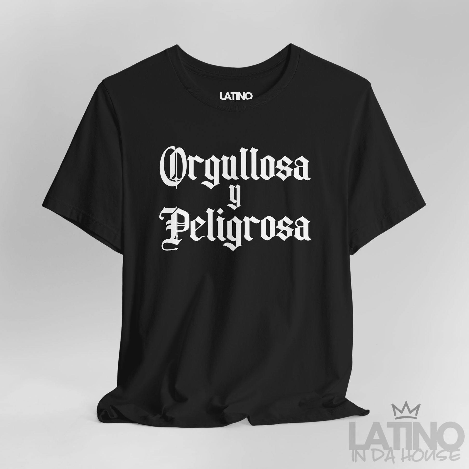 Close up Orgullosa y Peligrosa T-shirt in bold gothic white text on black background – Latino In Da House