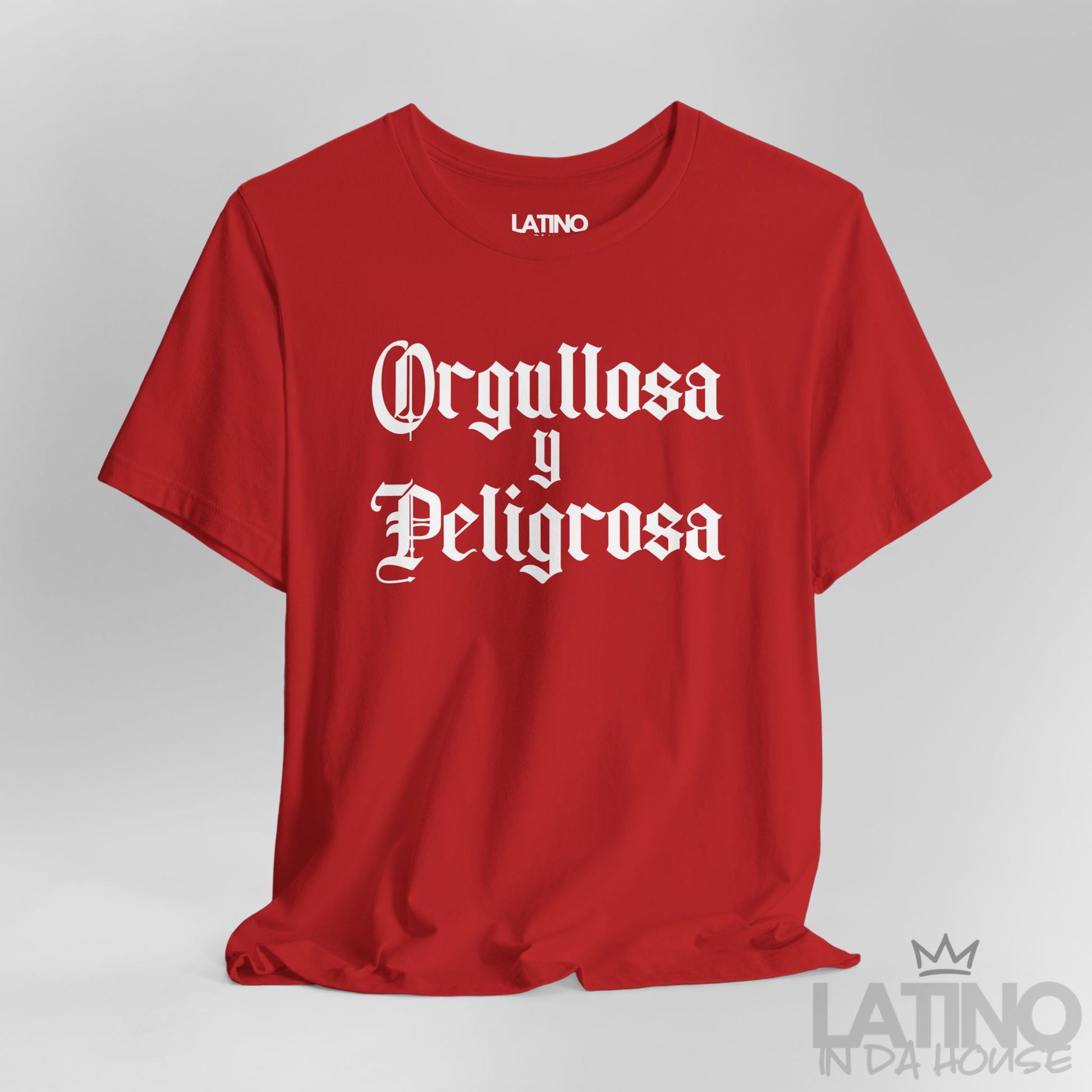 Close up Orgullosa y Peligrosa T-shirt in bold gothic white text on red background – Latino In Da House