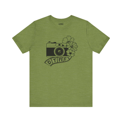 DTMF Heather Green T-Shirt pays tribute to the phrase "Debí Tirar Más Fotos". Latino In Da House
