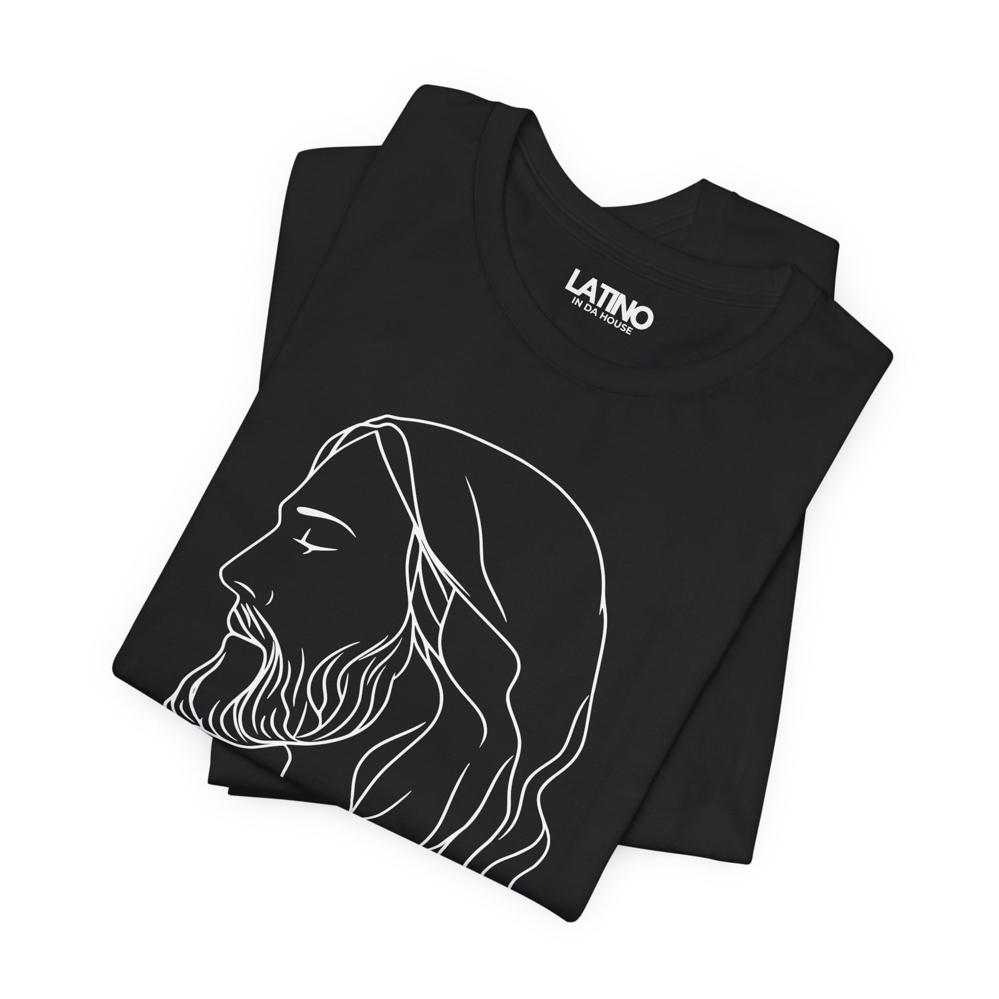 Minimal black faith tee flat lay with "El Rey, Primero y Siempre" text and Jesus line art.
Latino In Da House