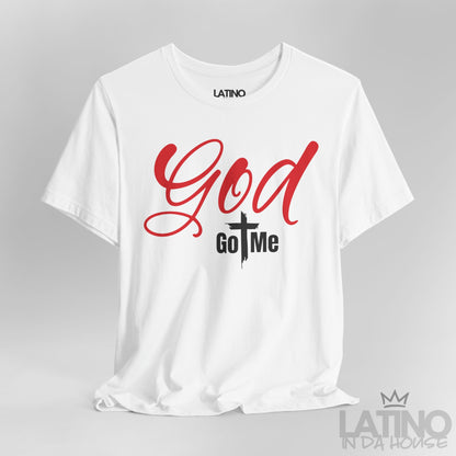 Close-up of God Got Me White T-Shirt showing bold red text and cross-centered design. Latino In Da House 