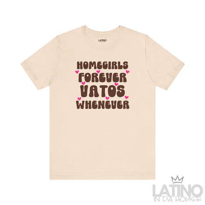 Soft cream T-shirt with “Homegirls Forever Vatos Whenever” text and pink hearts. Latino In Da House