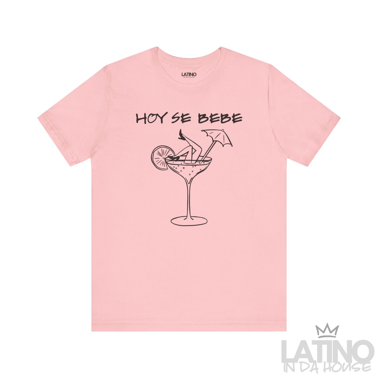 Pink T-shirt with “Hoy Se Bebe” text and cocktail glass with legs graphic. Latino In Da House 