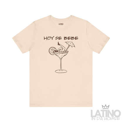 Soft cream T-shirt with “Hoy Se Bebe” text and cocktail glass with legs graphic. Latino In Da House 