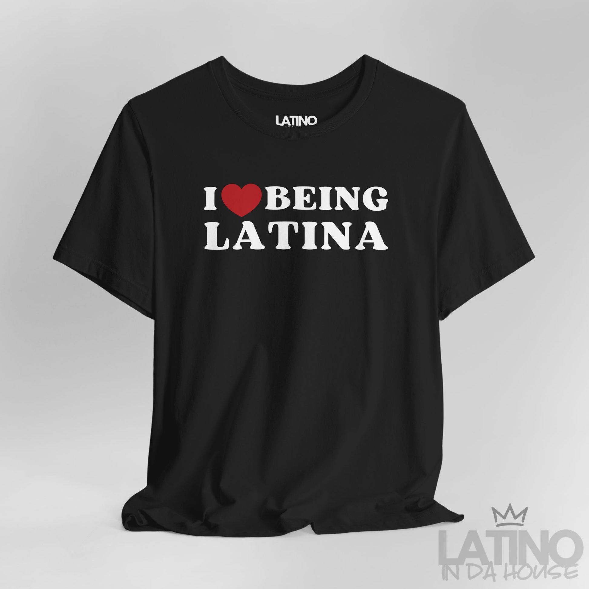 Black Close-up of “I Love Being Latina” T-shirt design showing heart and bold text.
Latino In Da House 