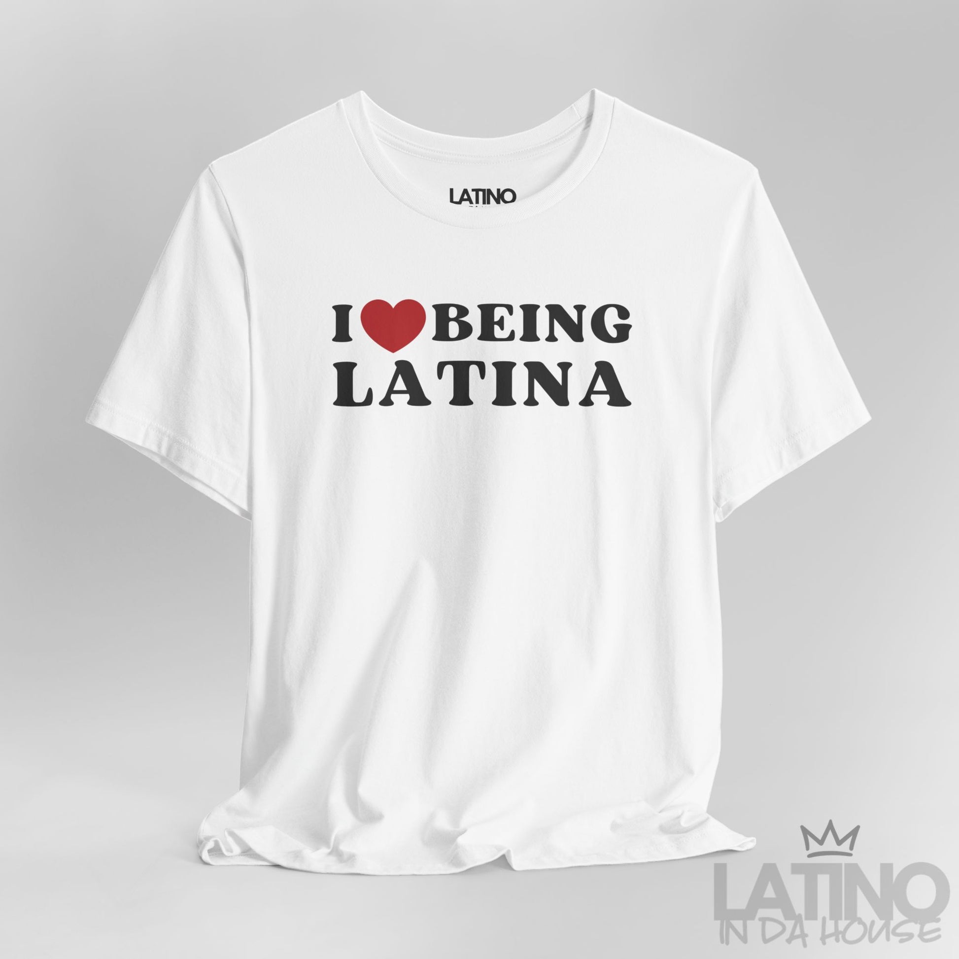 White Close-up of “I Love Being Latina” T-shirt design showing heart and bold text.
Latino In Da House 