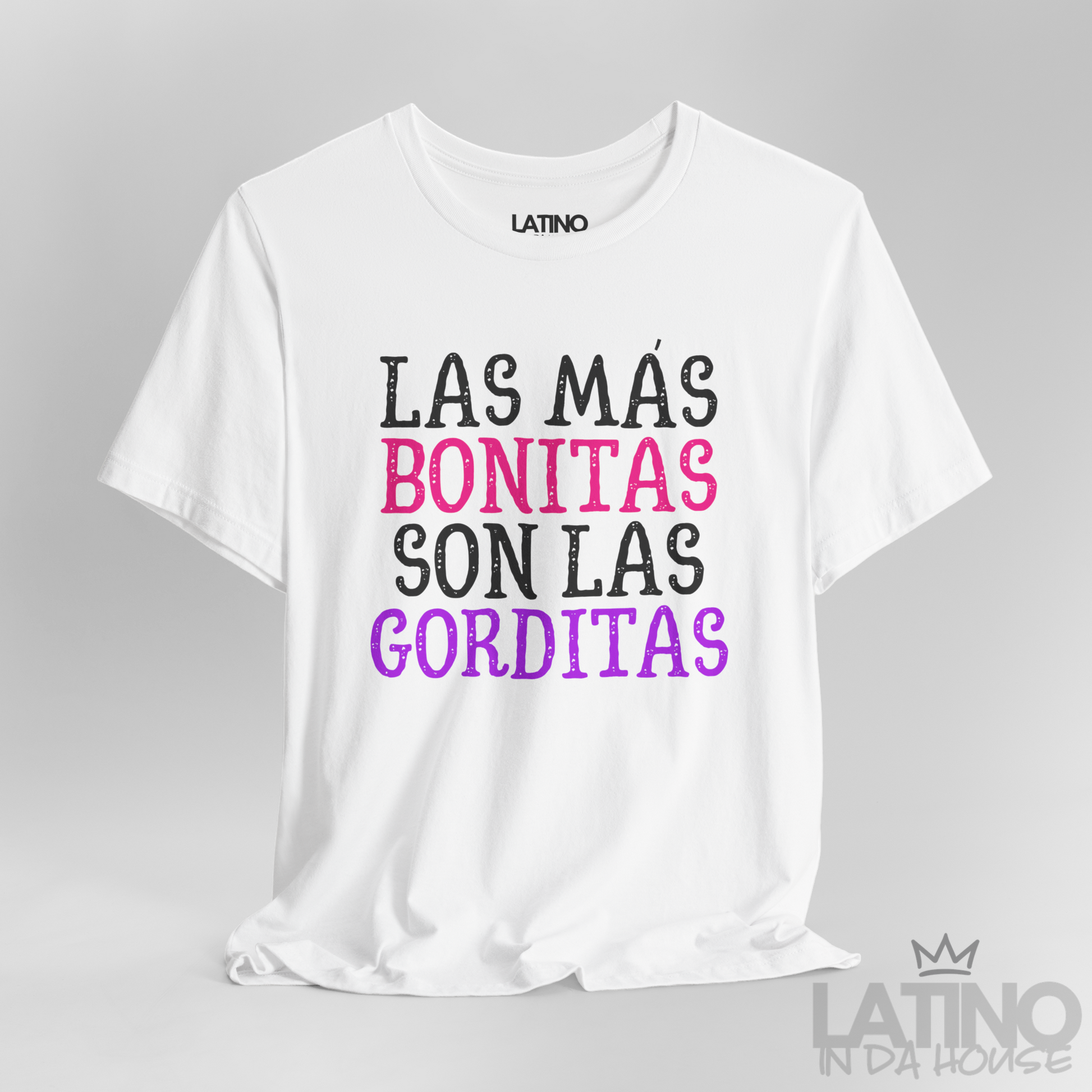 Close-up view of Las Más Bonitas Son Las Gorditas design on white T-Shirt. Latino In Da House