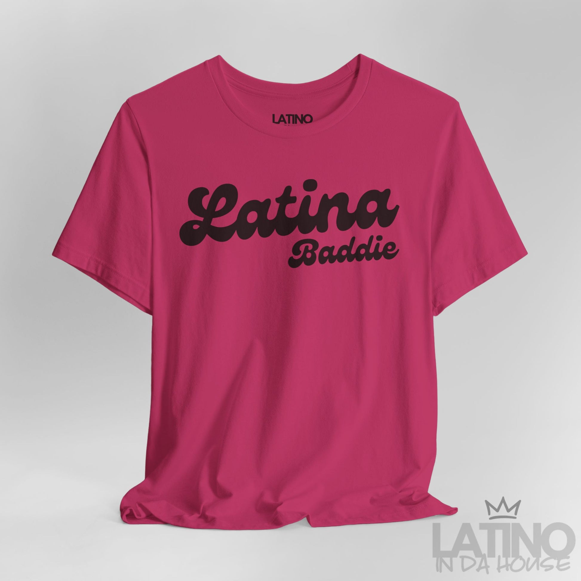 Close-up of berry “Latina Baddie” T-shirt design. Latino In Da House 