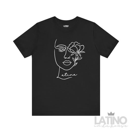 Black Latina T-shirt featuring sleek line art of a woman’s face with a floral accent, bold and contemporary design. Latino In Da House 