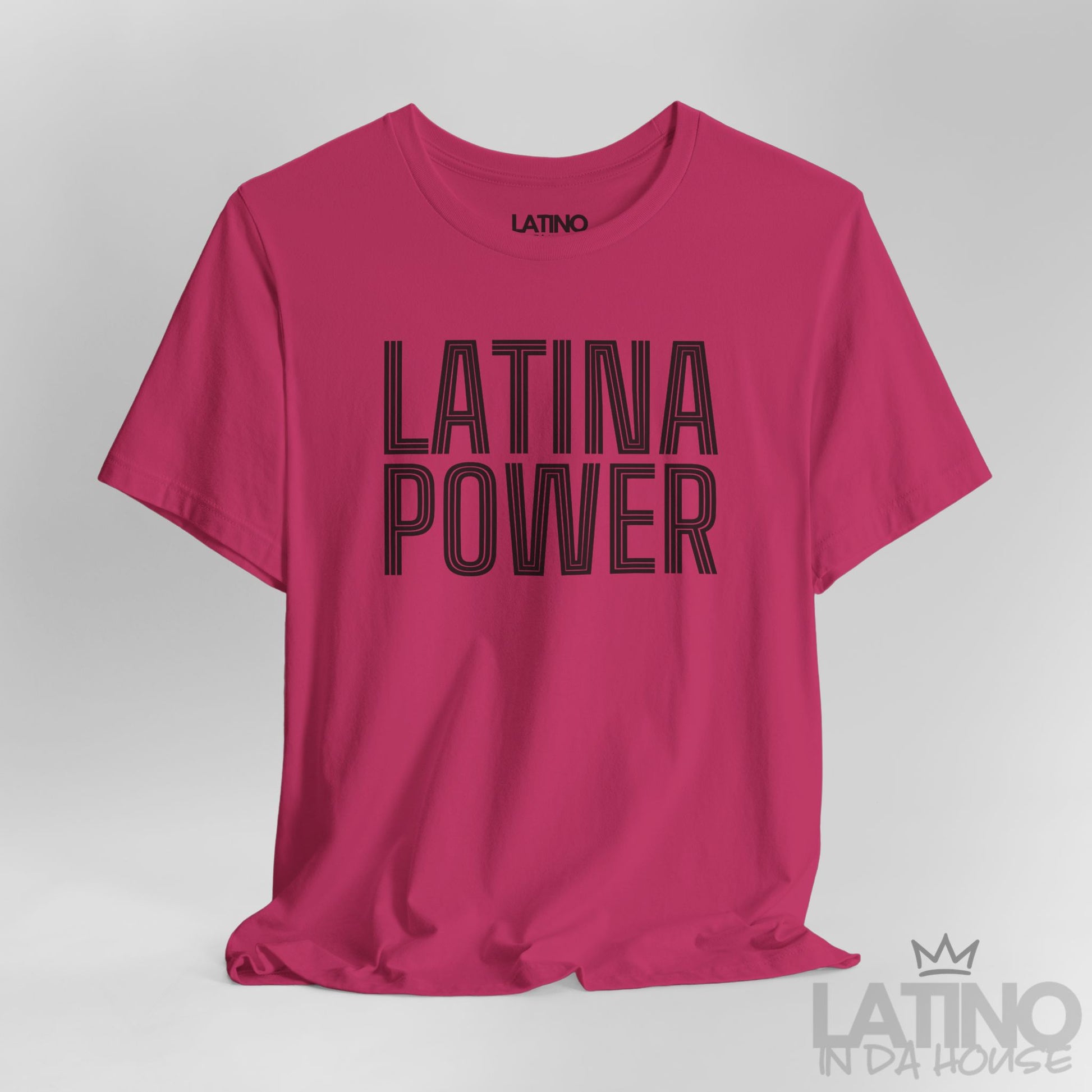 Close-up of berry Latina Power T-shirt with bold retro outlined lettering. Latino In Da House 