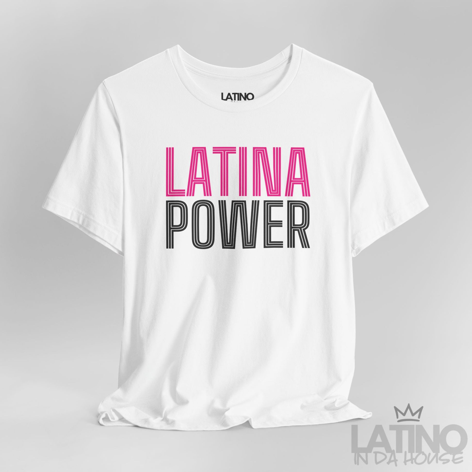 Close-up of berry Latina Power T-shirt with bold outlined lettering. Latino In Da House