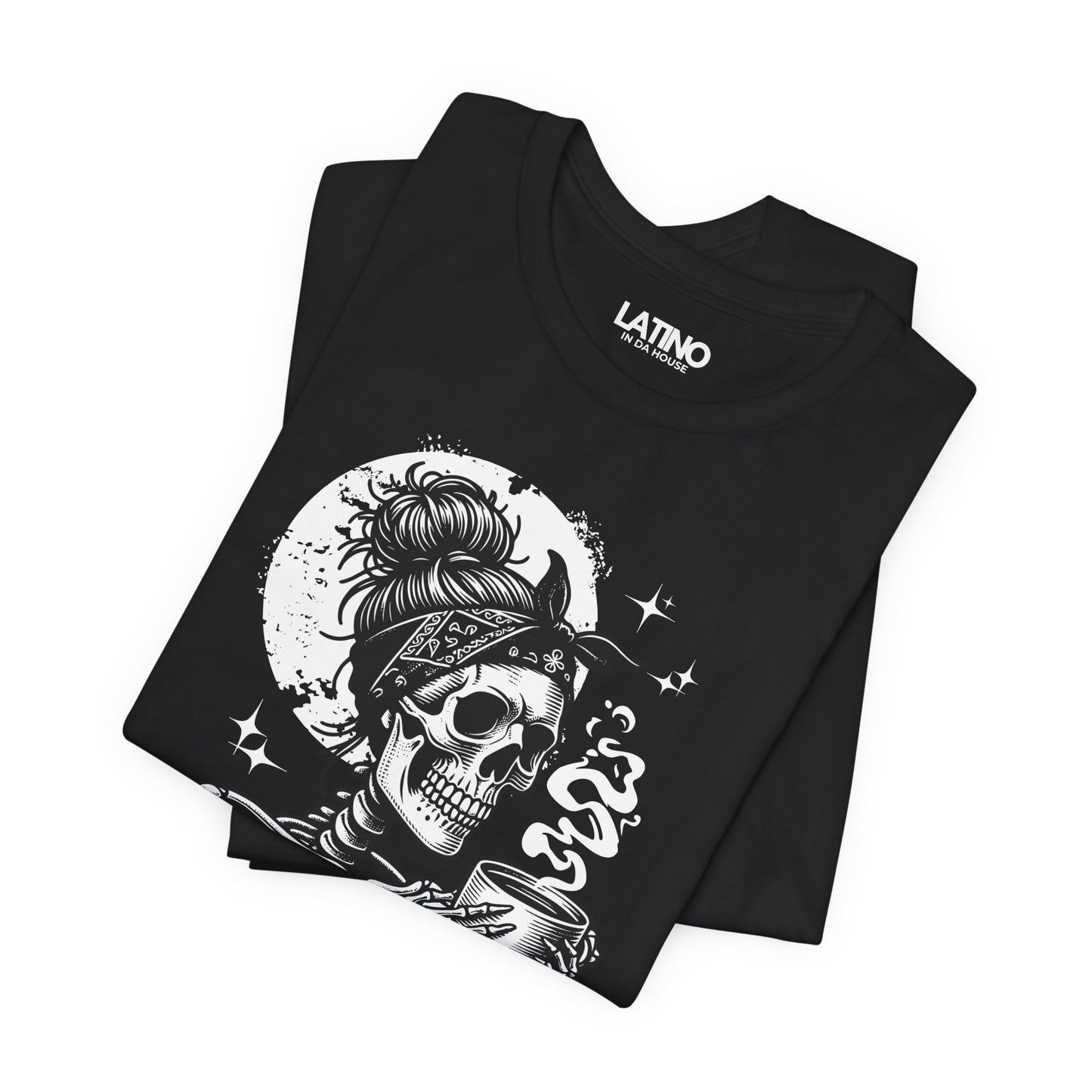 Folded black T-shirt with skeleton graphic holding coffee and text "Literally Cansada.
Latino In Da House